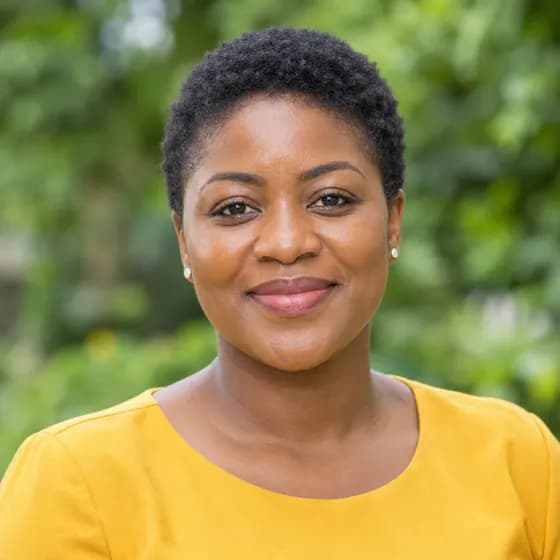 Sample portrait: a woman with short hair in a yellow top